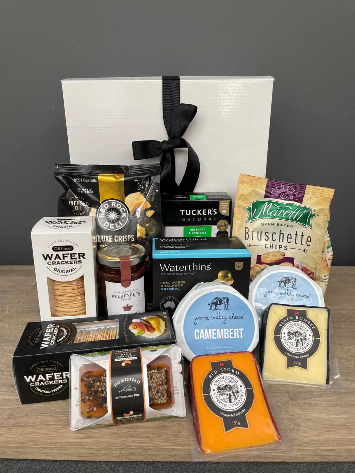Noosaville Gourmet Savoury and Cheese Hamper, Presented beautifully in a ribboned gift box together with a personalised gift card this gift box contains some great gourmet food with cheese. products may vary subject to availability will be to value
