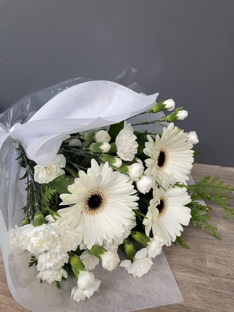 Snow White flowers small bouquet florist choice of mixed white blooms.