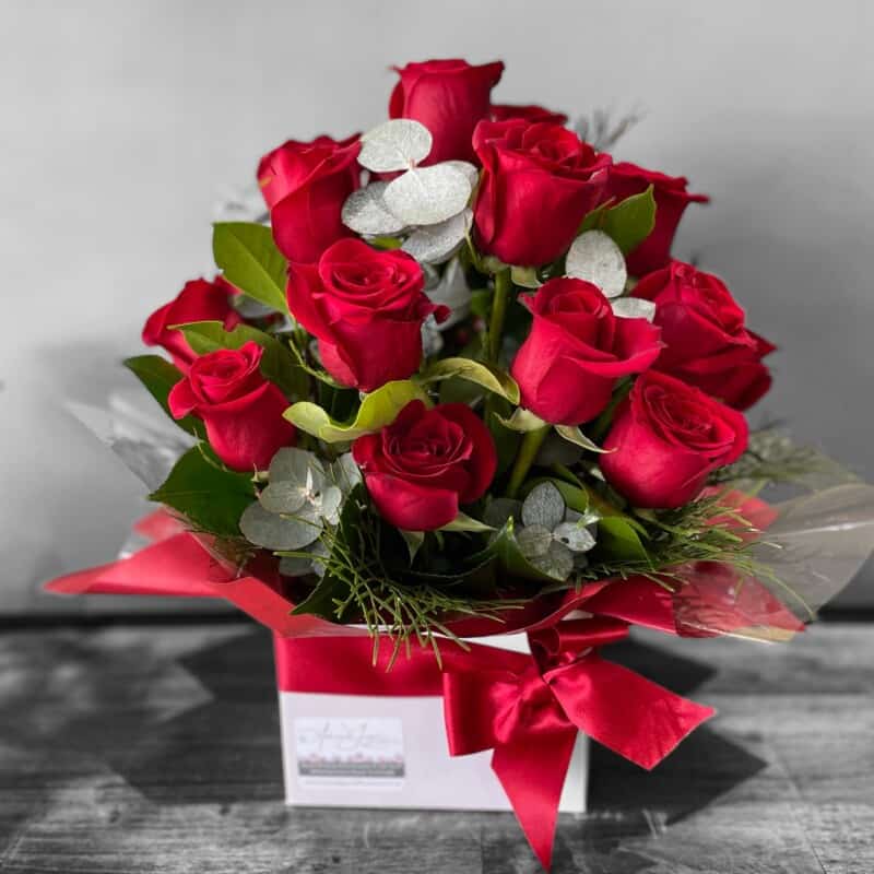 Scarlet Splendor Flower box arrangement of stunning red roses.