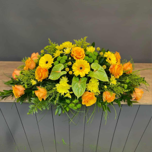 Sunset Funeral Casket Spray flowers